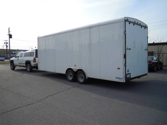 Closed moving trailer ready for transport